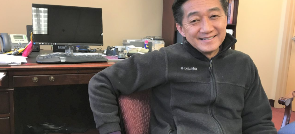 A photo of Dr. Lee in an office.
